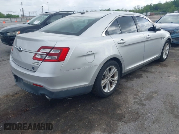 2013 Ford Taurus SEL with VIN 1FAHP2E81DG129229, listed as a IAAI auction lot 41898917 with 205,865 mi miles. Bid and sale history available at carsss.com. Image 4.