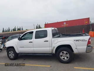 2014 Toyota Tacoma PreRunner z VIN 3TMJU4GN3EM170360, wystawiony jako IAAI lot #42438394 z przebiegiem 223 101 mil mil oraz . Historia ofert i sprzedaży dostępna na DreamBid. Obrazek 14.