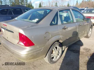 2001 Ford Focus SE with VIN 1FAFP34P71W313484, listed as a IAAI auction lot 41740406 with 141,385 mi miles and . Bid and sale history available at carsss.com. Image 4.