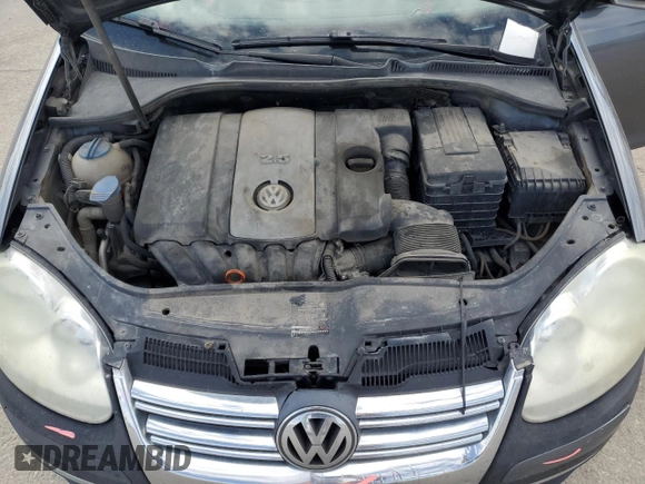2009 Volkswagen Jetta S with VIN 3VWJM71K59M007776, listed as a Copart auction lot 53959525 with 190,557 mi miles and Salvage title. Bid and sale history available at DreamBid. Image 11.