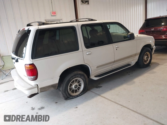 1998 Ford Explorer XL z VIN 1FMZU34E8WZB12600, wystawiony jako IAAI lot #42183517 z przebiegiem 196 799 mil mil oraz . Historia ofert i sprzedaży dostępna na DreamBid. Obrazek 4.