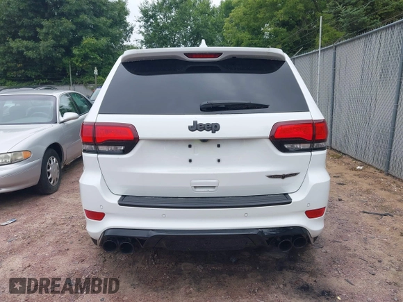 2021 Jeep Grand Cherokee Trackhawk with VIN 1C4RJFN95MC843131, listed as a IAAI auction lot 42688185 with 16,391 mi miles and . Bid and sale history available at DreamBid. Image 16.