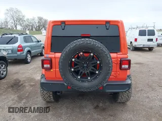 2020 Jeep Wrangler Unlimited Sahara with VIN 1C4HJXENXLW231194, listed as a IAAI auction lot 42083147 with 34,166 mi miles. Bid and sale history available at carsss.com. Image 17.