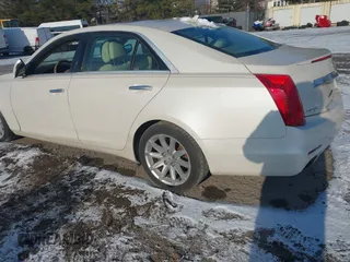 2014 Cadillac CTS Luxury RWD with VIN 1G6AR5SXXE0141931, listed as a IAAI auction lot 41352385 with 162,612 mi miles. Bid and sale history available at carsss.com. Image 3.