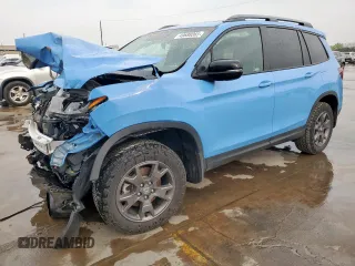 2024 Honda Passport TrailSport z VIN 5FNYF8H66RB010670, wystawiony jako Copart lot #49688065 z przebiegiem Nie podano mil oraz Szkoda całkowita • Salvage title. Historia ofert i sprzedaży dostępna na DreamBid. Obrazek 1.