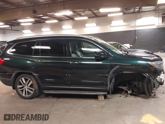 2016 Honda Pilot Touring with VIN 5FNYF6H98GB035226, listed as a IAAI auction lot 42022957 with 103,842 mi miles and . Bid and sale history available at DreamBid. Image 14.
