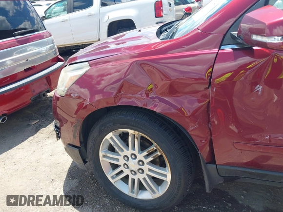 2015 Chevrolet Traverse LT with VIN 1GNKRGKD7FJ366703, listed as a IAAI auction lot 42397942 with 183,557 mi miles and . Bid and sale history available at DreamBid. Image 12.