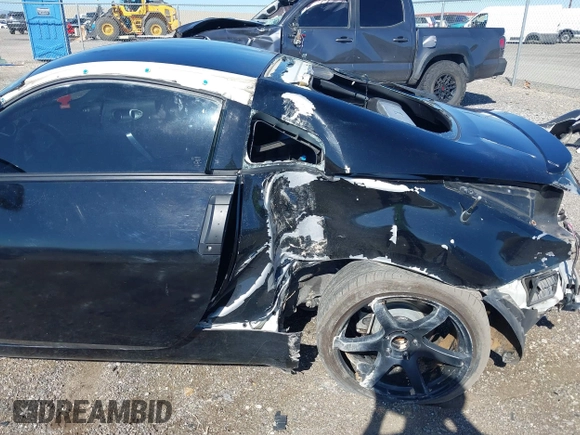 2004 Nissan 350Z Touring with VIN JN1AZ34D94M102990, listed as a IAAI auction lot 41830661 with 107,520 mi miles. Bid and sale history available at carsss.com. Image 6.