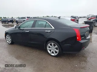 2014 Cadillac ATS Standard RWD with VIN 1G6AA5RX7E0112352, listed as a IAAI auction lot 42487515 with 98,009 mi miles and . Bid and sale history available at DreamBid. Image 6.