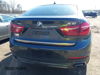 2019 BMW X6 xDrive35i z VIN 5UXKU2C51K0Z64589, wystawiony jako IAAI lot #41537380 z przebiegiem 60 769 mil mil oraz . Historia ofert i sprzedaży dostępna na DreamBid. Obrazek 17.