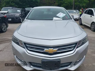 2014 Chevrolet Impala LT with VIN 2G1125S33E9103583, listed as a IAAI auction lot 42125293 with 143,951 mi miles and . Bid and sale history available at DreamBid. Image 6.