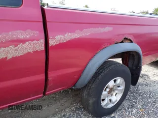 1998 Nissan Frontier with VIN 1N6DD26Y7WC378867, listed as a IAAI auction lot 42187874 with Not provided miles and . Bid and sale history available at DreamBid. Image 12.