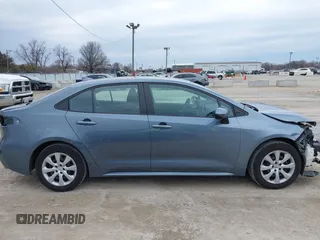 2021 Toyota Corolla LE with VIN 5YFEPMAE0MP228191, listed as a IAAI auction lot 41909486 with 66,374 mi miles. Bid and sale history available at carsss.com. Image 13.