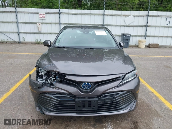 2019 Toyota Camry Hybrid LE z VIN 4T1B31HK4KU511360, wystawiony jako IAAI lot #42298260 z przebiegiem 133 019 mil mil oraz . Historia ofert i sprzedaży dostępna na DreamBid. Obrazek 12.