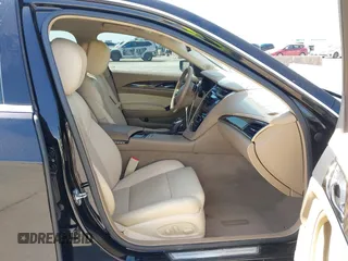 2014 Cadillac CTS Luxury RWD z VIN 1G6AR5SX3E0196348, wystawiony jako IAAI lot #42282732 z przebiegiem 130 956 mil mil oraz . Historia ofert i sprzedaży dostępna na DreamBid. Obrazek 5.