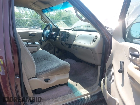 2000 Ford F-150 XL with VIN 1FTZF1721YNB05244, listed as a IAAI auction lot 42298391 with Not provided miles and . Bid and sale history available at DreamBid. Image 5.