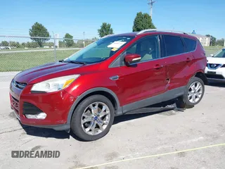 2015 Ford Escape Titanium with VIN 1FMCU9J92FUA53699, listed as a IAAI auction lot 40500310 with 197,581 mi miles. Bid and sale history available at carsss.com. Image 2.
