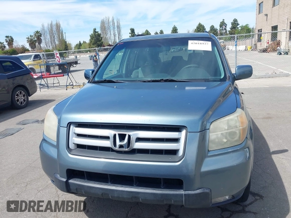 2007 Honda Pilot EX with VIN 2HKYF18447H520522, listed as a IAAI auction lot 42018937 with 128,401 mi miles. Bid and sale history available at carsss.com. Image 12.