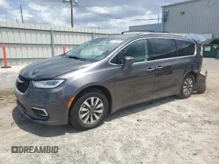 2021 Chrysler Pacifica Touring L with VIN 2C4RC1BGXMR512438, listed as a Copart auction lot 60142945 with 89,499 mi miles and Salvage title. Bid and sale history available at DreamBid. Image 1.