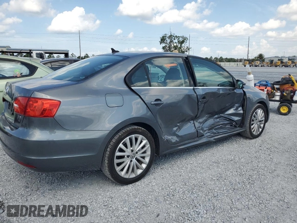 2014 Volkswagen Jetta TDI w/Premium with VIN 3VWLL7AJ7EM436916, listed as a Copart auction lot 58238385 with 103,265 mi miles and Salvage title. Bid and sale history available at DreamBid. Image 3.