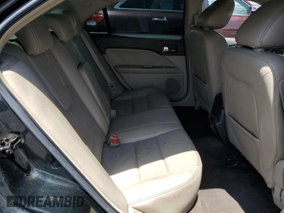 2010 Ford Fusion Hybrid z VIN 3FADP0L33AR185719, wystawiony jako Copart lot #59821115 z przebiegiem 154 019 mil mil oraz Czysty tytuł • Clean title. Historia ofert i sprzedaży dostępna na DreamBid. Obrazek 10.