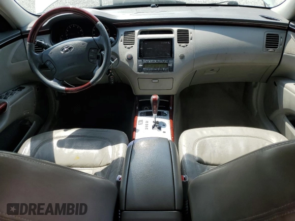 2007 Hyundai Azera SE z VIN KMHFC46F27A181641, wystawiony jako Copart lot #52485025 z przebiegiem 223 170 mil mil oraz Nie do naprawy • Non repairable. Historia ofert i sprzedaży dostępna na DreamBid. Obrazek 8.