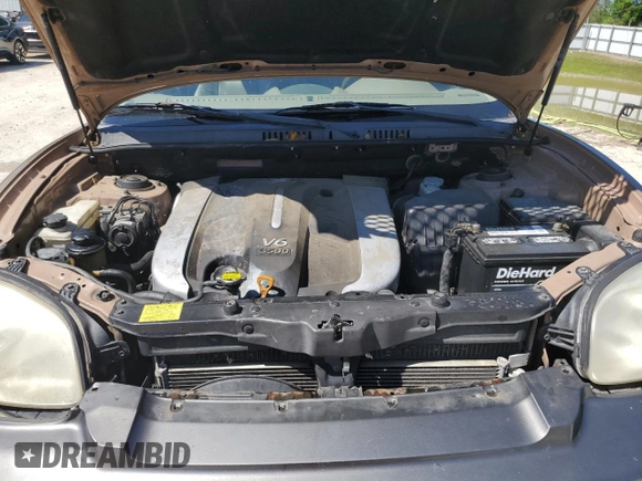2004 Hyundai Santa Fe GLS z VIN KM8SC13E14U618502, wystawiony jako Copart lot #58607145 z przebiegiem 160 672 mil mil oraz Szkoda całkowita • Salvage title. Historia ofert i sprzedaży dostępna na DreamBid. Obrazek 12.