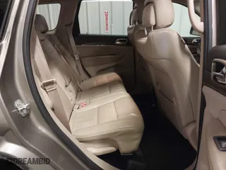 2016 Jeep Grand Cherokee Limited 75th Anniversary with VIN 1C4RJFBG6GC453307, listed as a IAAI auction lot 41657982 with 141,647 mi miles. Bid and sale history available at carsss.com. Image 8.