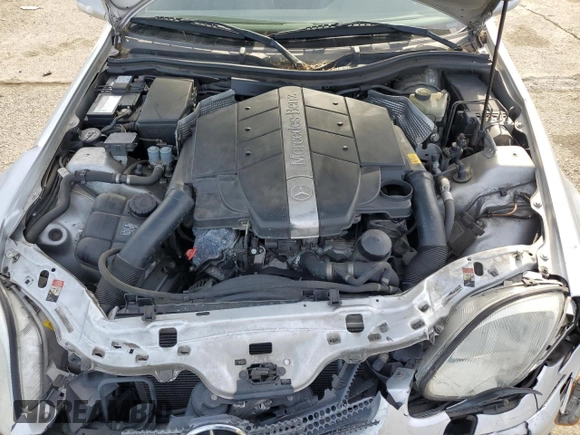 2002 Mercedes-Benz SLK 320 z VIN WDBKK65F22F253077, wystawiony jako Copart lot #50562985 z przebiegiem 152 195 mil mil oraz Szkoda całkowita • Salvage title. Historia ofert i sprzedaży dostępna na DreamBid. Obrazek 11.