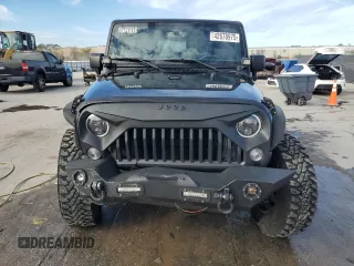 2017 Jeep Wrangler Willys Wheeler with VIN 1C4AJWAG1HL624254, listed as a Copart auction lot 42678975 with 51,936 mi miles and Salvage Title. Bid and sale history available at DreamBid. Image 5.