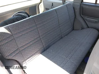 1998 Jeep Cherokee Sport with VIN 1J4FJ68S9WL189992, listed as a IAAI auction lot 42039822 with 156,006 mi miles. Bid and sale history available at carsss.com. Image 8.