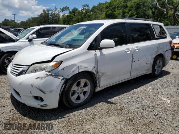 2015 Toyota Sienna LE AAS with VIN 5TDKK3DC1FS660904, listed as a Copart auction lot 61418275 with 132,056 mi miles and Salvage title. Bid and sale history available at DreamBid. Image 1.