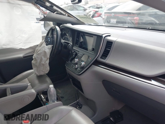 2015 Toyota Sienna XLE with VIN 5TDYK3DC2FS686969, listed as a IAAI auction lot 42559541 with 103,190 mi miles and . Bid and sale history available at DreamBid. Image 5.