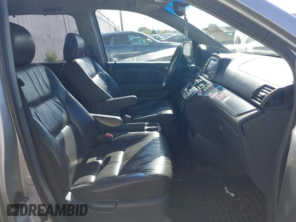 2005 Honda Odyssey TOURING with VIN 5FNRL38855B069043, listed as a IAAI auction lot 42035153 with 236,533 mi miles. Bid and sale history available at carsss.com. Image 5.