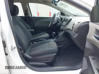 2012 Chevrolet Sonic LT with VIN 1G1JC5SH1C4126756, listed as a IAAI auction lot 42868558 with 163,633 mi miles and . Bid and sale history available at DreamBid. Image 5.