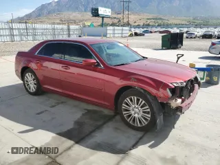 2014 Chrysler 300 z VIN 2C3CCARG0EH249562, wystawiony jako Copart lot #60331535 z przebiegiem 153 730 mil mil oraz Szkoda całkowita • Salvage title. Historia ofert i sprzedaży dostępna na DreamBid. Obrazek 4.