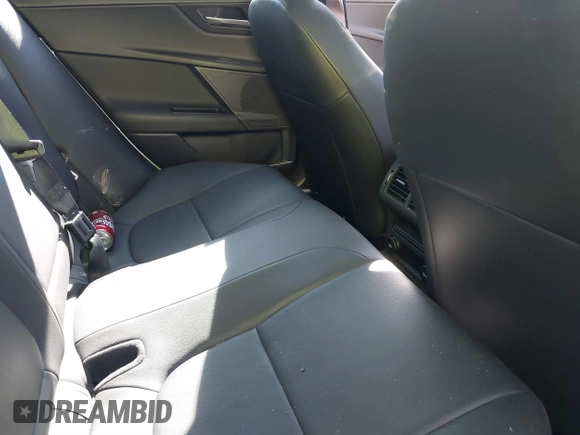 2017 Jaguar XE 25t Premium with VIN SAJAD4BG8HA976156, listed as a IAAI auction lot 41496861 with 83,824 mi miles. Bid and sale history available at carsss.com. Image 8.