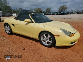 1998 Porsche Boxster с VIN WP0CA2982WU623104, выставлен на аукционе Copart как лот 50941005 с пробегом 78 486 миль миль и Чистый • Clean title. История ставок и продаж доступна на DreamBid. Изображение 4.