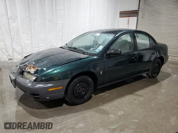 1998 Saturn SL z VIN 1G8ZH5280WZ312544, wystawiony jako Copart lot #50971665 z przebiegiem 119 855 mil mil oraz Szkoda całkowita • Salvage title. Historia ofert i sprzedaży dostępna na DreamBid. Obrazek 1.