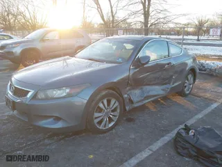 2010 Honda Accord Cpe LX-S with VIN 1HGCS1B30AA002882, listed as a IAAI auction lot 41427896 with 112,848 mi miles. Bid and sale history available at carsss.com. Image 2.