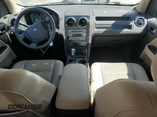 2008 Ford Taurus X SEL z VIN 1FMDK02W58GA27299, wystawiony jako Copart lot #54070345 z przebiegiem 82 629 mil mil oraz Szkoda całkowita • Salvage title. Historia ofert i sprzedaży dostępna na DreamBid. Obrazek 8.