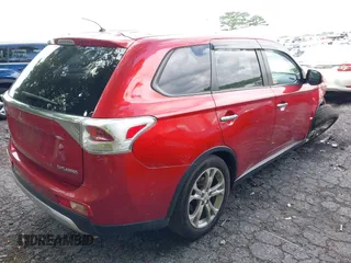 2015 Mitsubishi Outlander SE with VIN JA4AD3A35FZ005812, listed as a IAAI auction lot 42302752 with 165,483 mi miles and . Bid and sale history available at DreamBid. Image 4.
