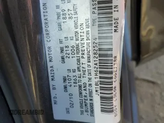 2010 Mazda 3 S Sport with VIN JM1BL1H62A1282524, listed as a Copart auction lot 52634525 with 149,301 mi miles and Salvage Title. Bid and sale history available at DreamBid. Image 12.