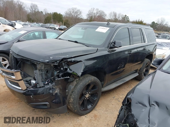 2015 Chevrolet Tahoe LT with VIN 1GNSCBKC5FR156050, listed as a IAAI auction lot 41486815 with 220,599 mi miles and . Bid and sale history available at DreamBid. Image 2.