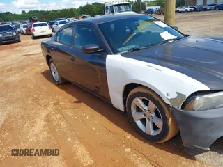2014 Dodge Charger SE z VIN 2C3CDXBG5EH315467, wystawiony jako IAAI lot #42273742 z przebiegiem 153 493 mil mil oraz . Historia ofert i sprzedaży dostępna na DreamBid. Obrazek 18.