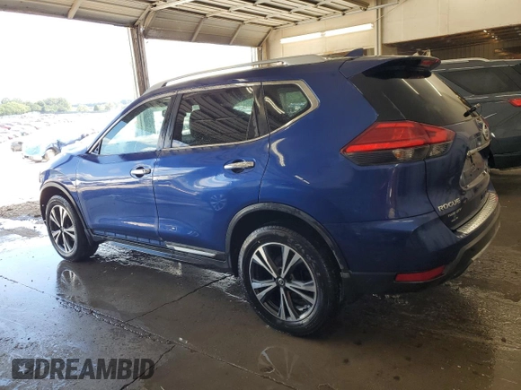 2017 Nissan Rogue SV with VIN 5N1AT2MV2HC878595, listed as a Copart auction lot 65213435 with 124,034 mi miles and Salvage title. Bid and sale history available at DreamBid. Image 2.