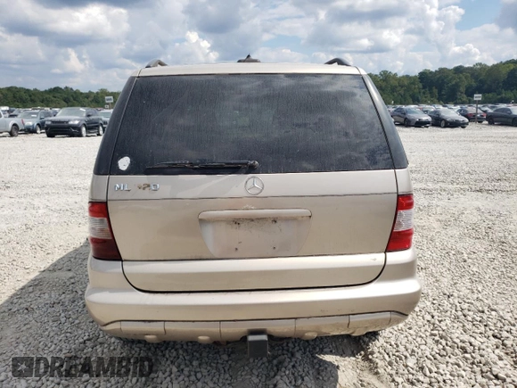 2002 Mercedes-Benz M-Class with VIN 4JGAB54E72A322046, listed as a Copart auction lot 74393084 with 128,015 mi miles and Salvage Title. Bid and sale history available at carsss.com. Image 6.