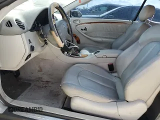 2003 Mercedes-Benz CLK-Class 3.2L with VIN WDBTJ65J63F050559, listed as a Copart auction lot 77650564 with 218,619 mi miles and Clean Title. Bid and sale history available at carsss.com. Image 7.