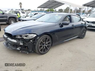 2024 BMW 8 Series M850i z VIN WBAGV8C02RCR25432, wystawiony jako IAAI lot #42068364 z przebiegiem 13 765 mil mil oraz . Historia ofert i sprzedaży dostępna na DreamBid. Obrazek 2.