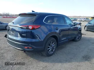 2021 Mazda CX-9 Touring with VIN JM3TCBCY9M0510474, listed as a IAAI auction lot 41722933 with 109,131 mi miles. Bid and sale history available at carsss.com. Image 4.